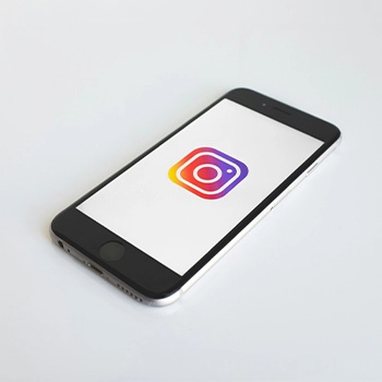 Mobile phone with Instagram logo on the screen